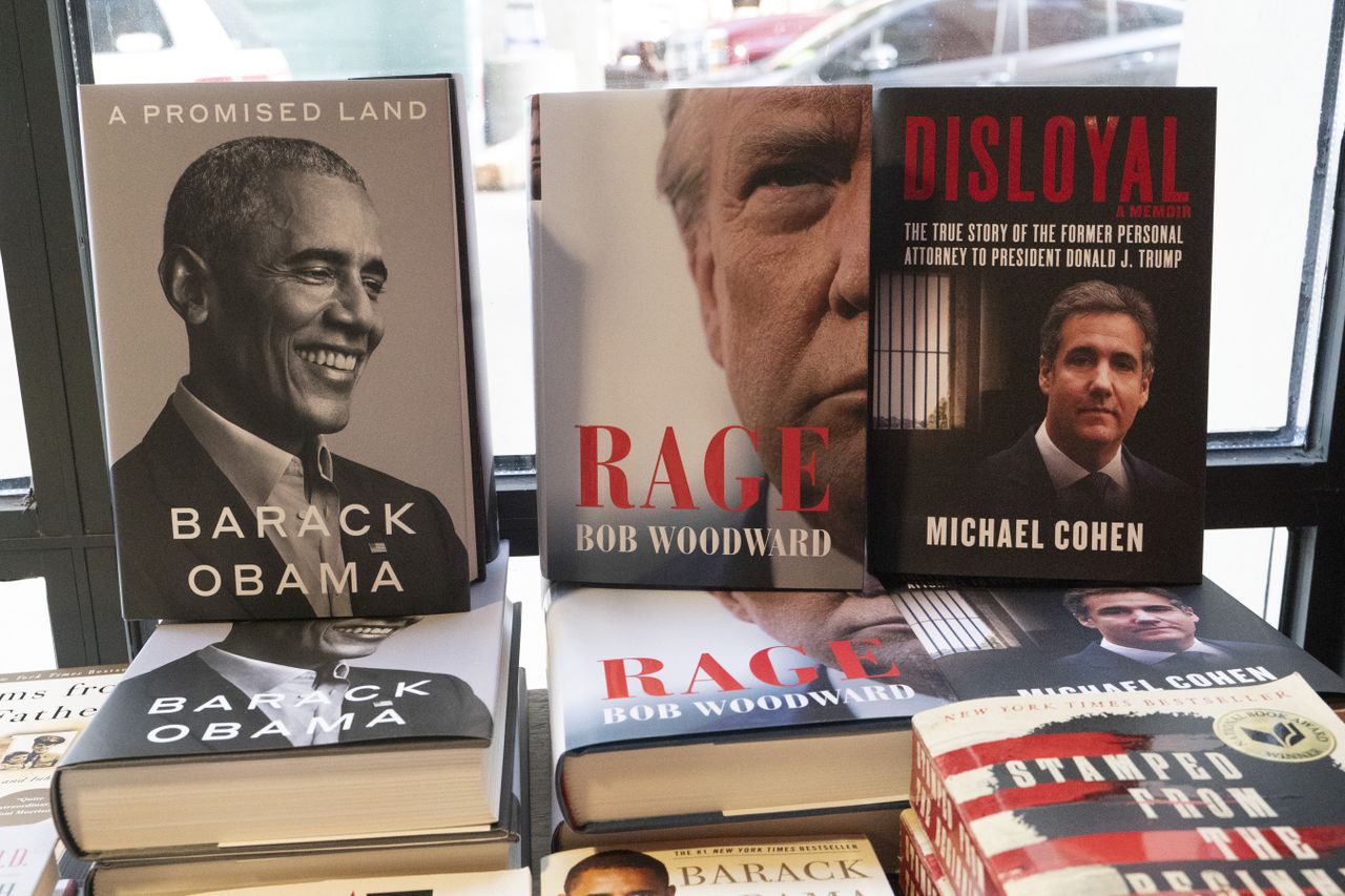 Books by Barack Obama, Bob Woodward, and Michael Cohen in a New York bookstore