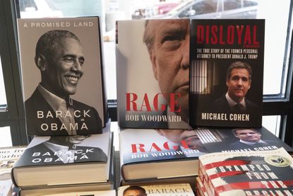 Books by Barack Obama, Bob Woodward, and Michael Cohen in a New York bookstore