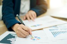 Person reviewing their finances