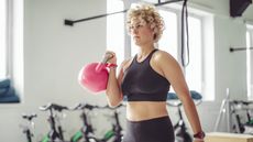 Woman working out with a kettlebell