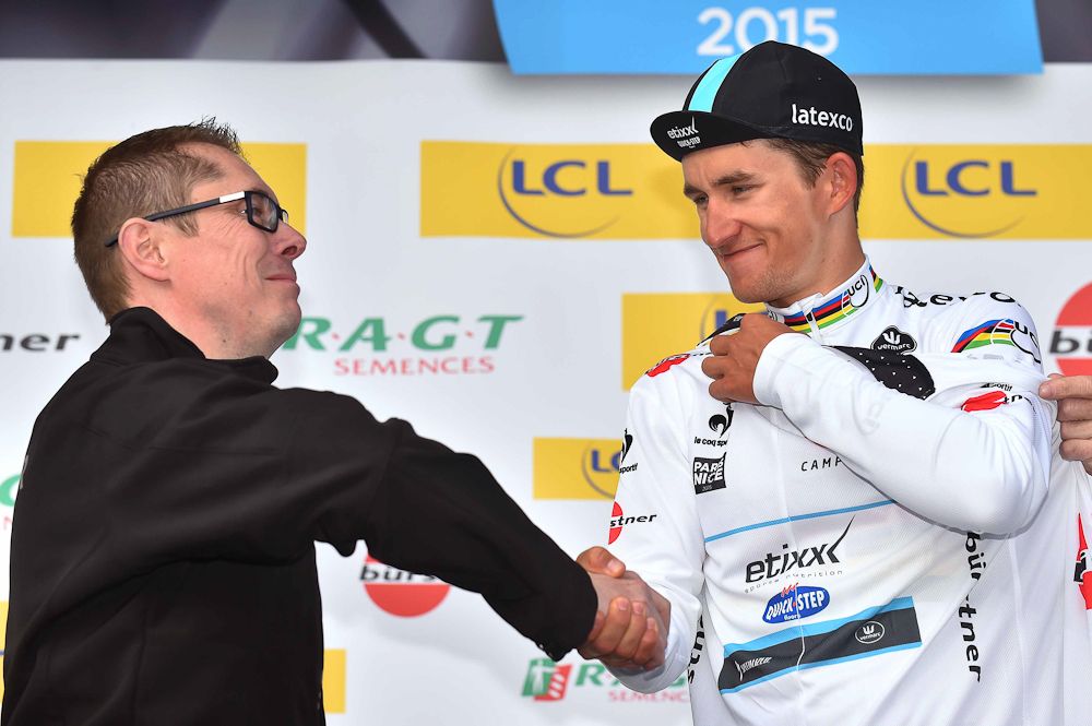 Michal Kwiatkowski in the white jersey.