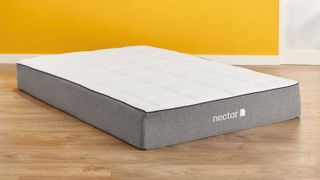 Nectar mattress in a yellow bedroom
