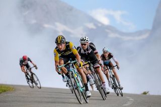 Primoz Roglic leads the chase group off the top of the Col d'Aubisque