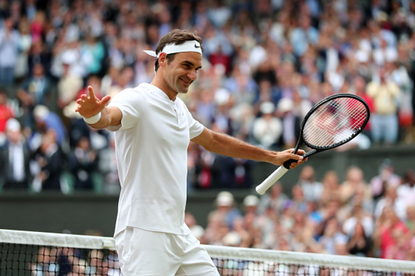 Roger Federer celebrates at Wimbledon