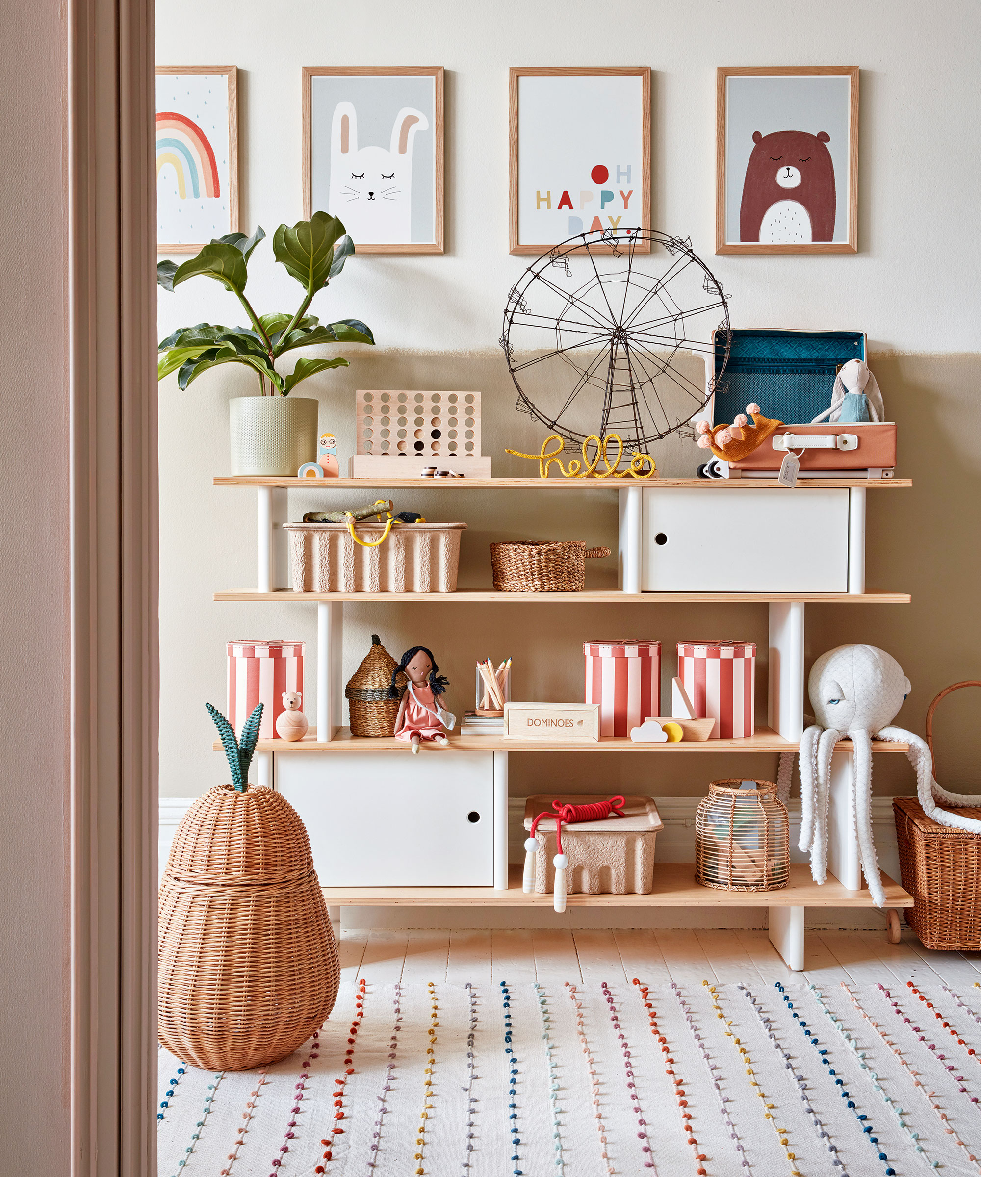 Kids bedroom with open shelving storage with toys and baskets