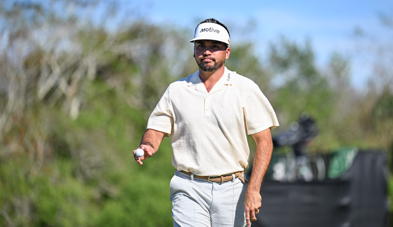 Jason Day waves to the crowd