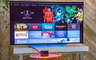 The Amazon Fire TV Cube plugged into a TV
