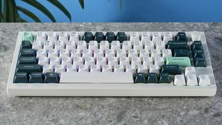 The Keychron Q1 HE magnetic keyboard in white and green