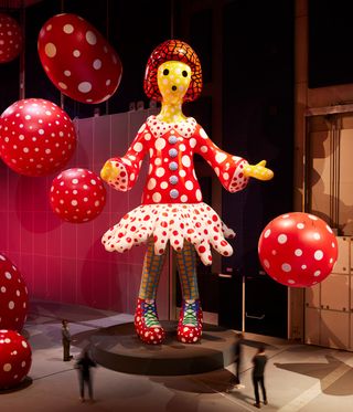 inflatable doll and spotty balloons at Yayoi Kusama show