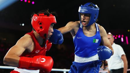 Imane Khelif lands a punch on Thailand's Janjaem Suwannapheng during the Women's 66kg semi-final on Tuesday