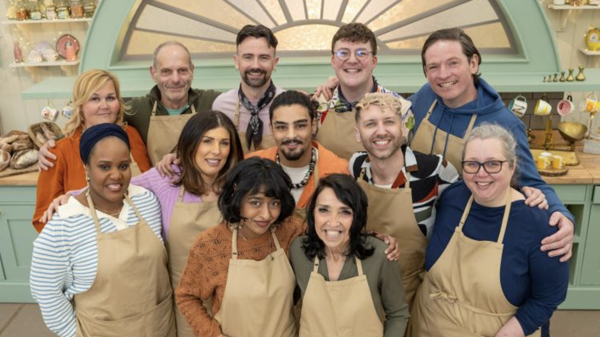 The Great British Bake Off 2024 Contestants in a huddle