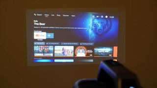 Anker Nebula Mars 3 Android TV interface projected on screen