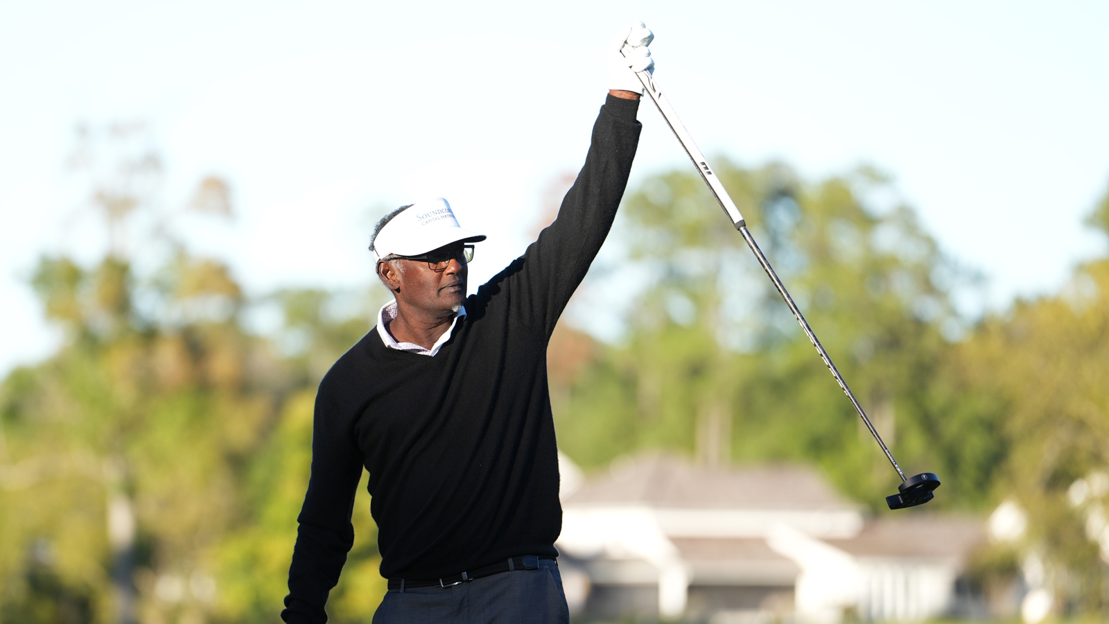 Vijay Singh celebrates after holing a putt