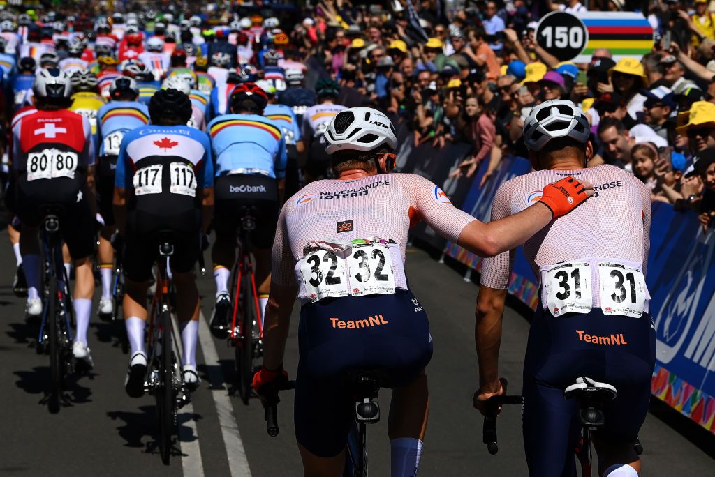 WOLLONGONG AUSTRALIA SEPTEMBER 25 LR Pascal Eenkhoorn of The Netherlands and Mathieu Van Der Poel of The Netherlands abandoning the race during the 95th UCI Road World Championships 2022 Men Elite Road Race a 2669km race from Helensburgh to Wollongong Wollongong2022 on September 25 2022 in Wollongong Australia Photo by Tim de WaeleGetty Images