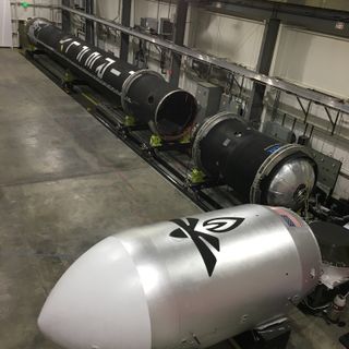 Firefly Aerospace's Alpha rocket first stage, upper stage and payload fairing undergo fit checks ahead of its first launch.