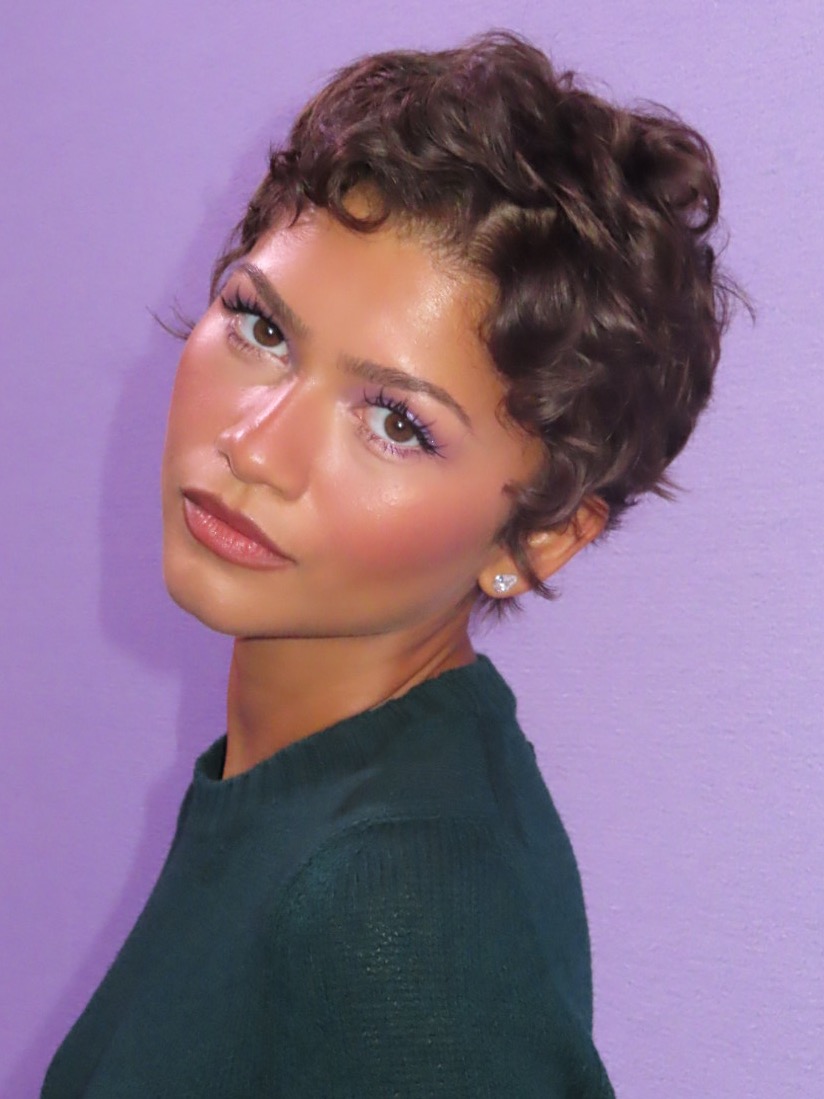 Zendaya wearing lilac makeup by Ernest Casillas using Prada beauty products.
