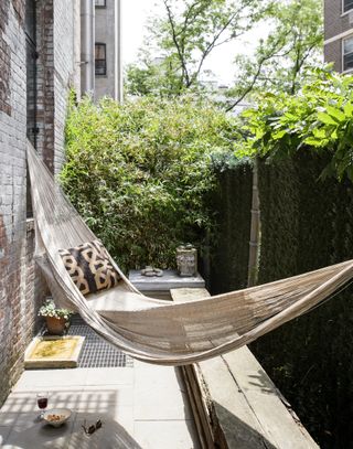 Small garden with hammock and greenery