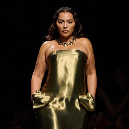 paloma wears a gold choker necklace and a strapless gold dress during the ferragamo fall/winter 2026 show.