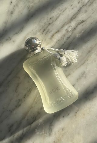 Valaya Exclusif perfume bottle on marble background