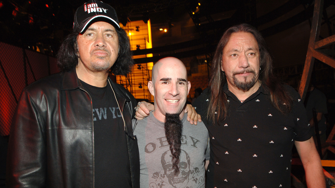 A picture of Scott Ian with Gene Simons and Ace Frehley in 2006