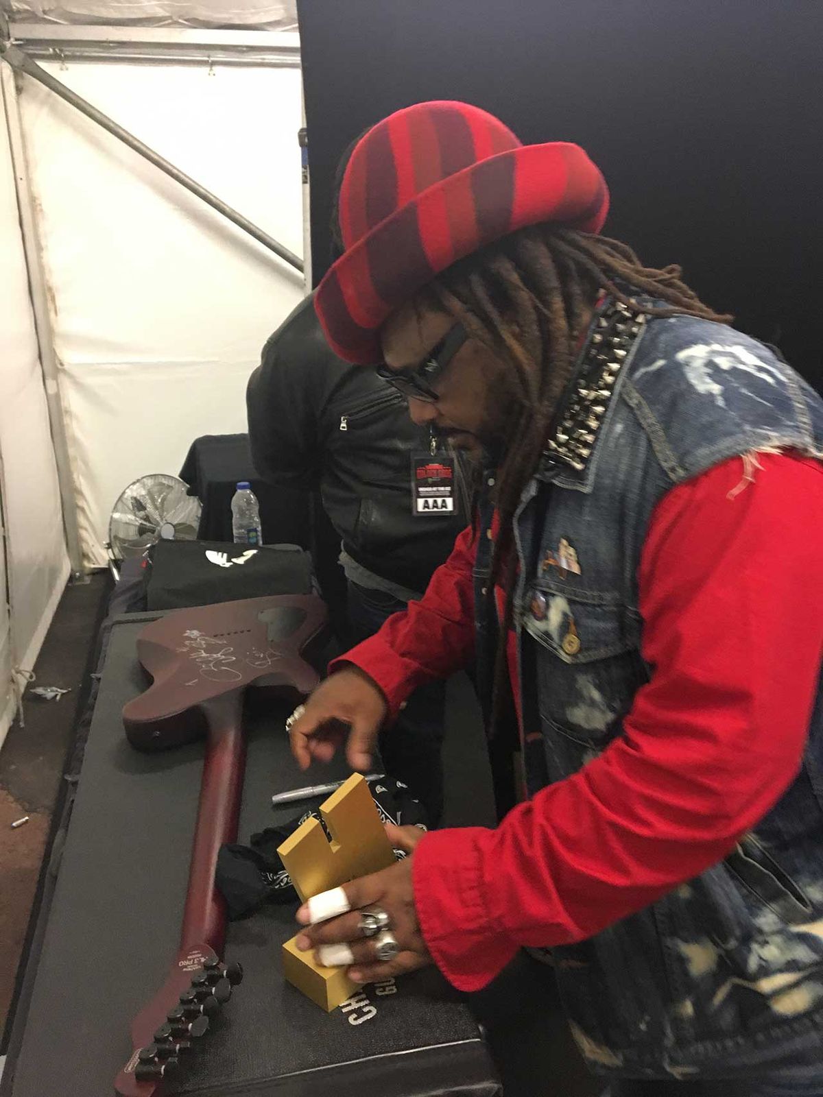 Benji Webbe and signed guitar