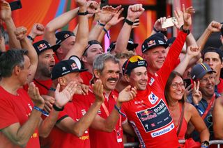 MADRID SPAIN SEPTEMBER 08 LR Team Manager Ralph Denk final overall winner and Primoz Roglic of Slovenia Red Leader Jersey and Team Red Bull Bora hansgrohe celebrates at podium as Red Leader Jersey winner during the La Vuelta 79th Tour of Spain 2024 Stage 21 a 246km individual time trial stage from Madrid to Madrid UCIWT on September 08 2024 in Madrid Spain Photo by Dario BelingheriGetty Images