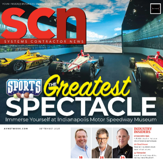 F1 cars sit in an immersive simulation on the cover of SCN Magazine.