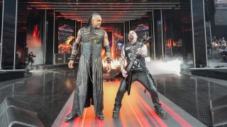 Kerry King standing with Damian Priest on the Wrestlemania ramp
