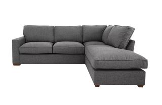 A dark grey chaise sofa bed