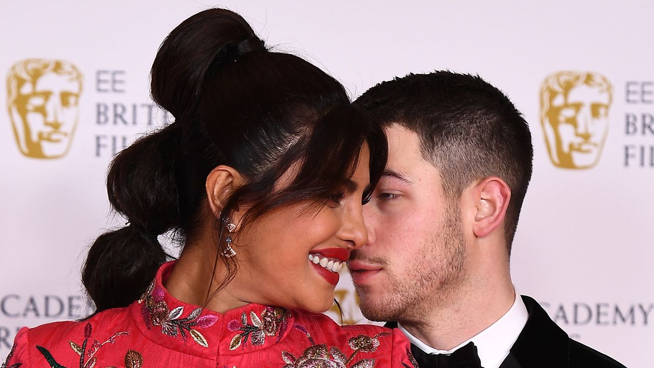 LONDON, ENGLAND - APRIL 11: Awards Presenter Priyanka Chopra Jonas with her husband Nick Jonas attend the EE British Academy Film Awards 2021 at the Royal Albert Hall on April 11, 2021 in London, England. (Photo by Jeff Spicer/Getty Images)