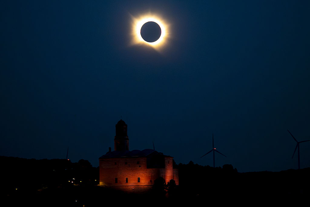 A total solar eclipse darkens the skies over northeastern Spain, with Corbera d&amp;acirc;Ebre, in Tarragona, Spain, on August 12, 2026, among the locations along the path of totality. (Photo by Stringer/Anadolu via Getty Images)