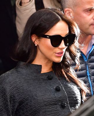 Meghan Markle wears black cat-eye sunglasses by Le Specs