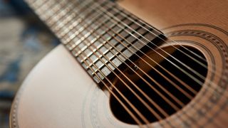 A photo of a vintage 12-string acoustic guitar