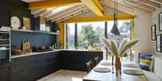  Architect George Woodrow’s extended kitchen impresses with bespoke joinery and jaunty yellow accents, and it’s the perfect sociable space for his young family 