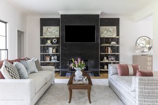 formal living room with media wall