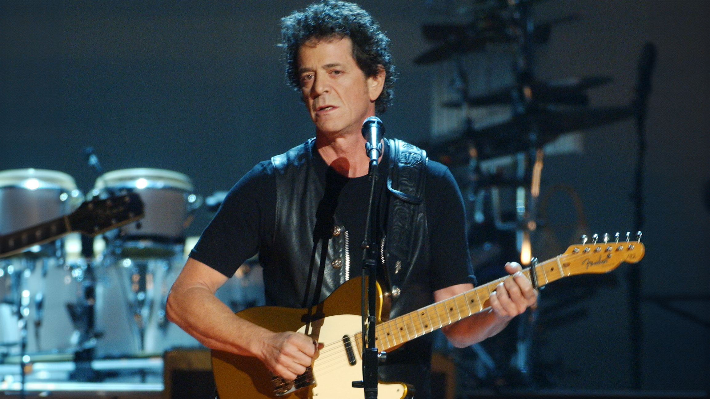 Lou Reed performs at "Come Together: A Night for John Lennon's Words and Music," in New York CIty, October 2, 2001.