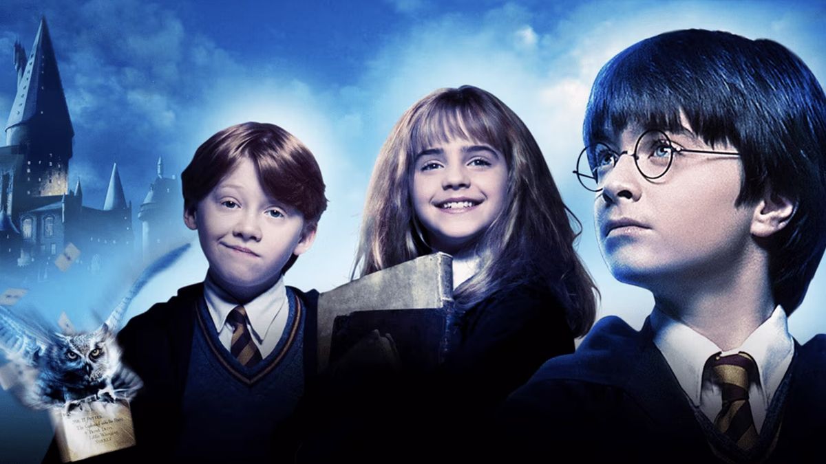 A still of young Daniel Radcliffe, Emma Watson and Rupert Grint in Harry Potter 