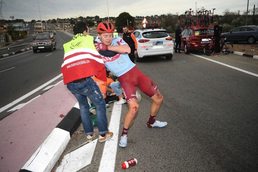 Harry Tanfield is picked up off the ground after a crash early on