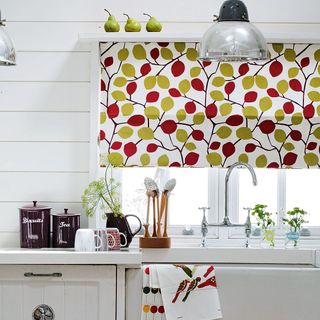 kitchen with white wall and window blinds