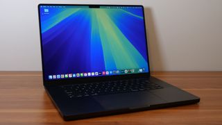 Apple MacBook Pro 16-inch M4 Pro 2024 on a wooden desk