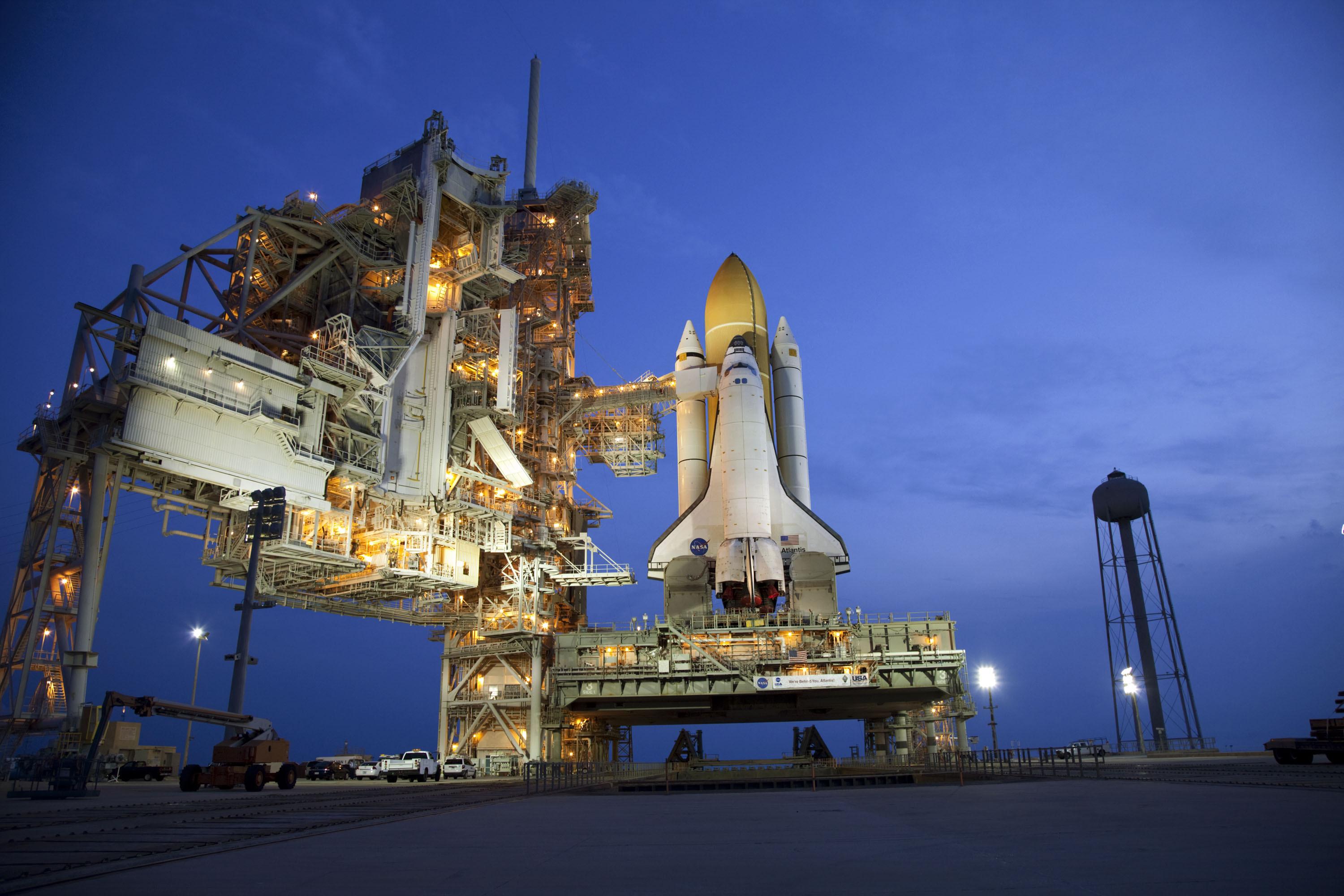 Space shuttle Atlantis stands on Launch Pad 39A at NASA&#039;s Kennedy Space Center in Florida, where it is set to liftoff on STS-135, the final shuttle mission. 