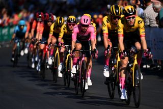 Primož Roglič is protected by his Jumbo-Visma teammates during the Giro d'Italia