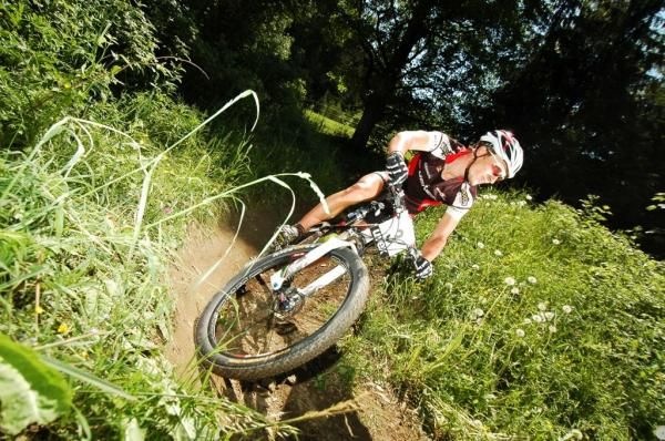 Matthias Leisling rides on a downhill section.