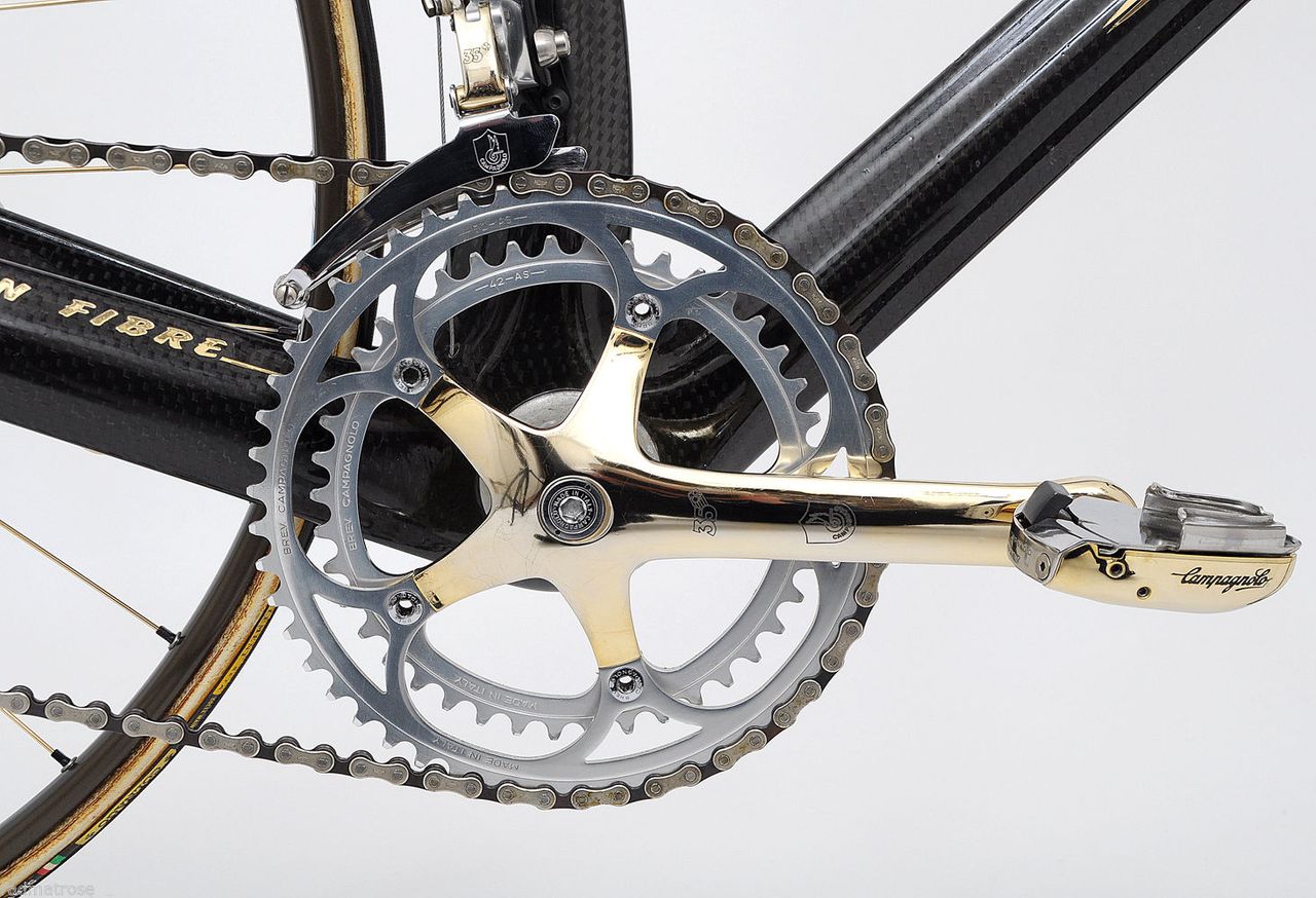 The bike features gold-plated Campagnolo C-Record cranks