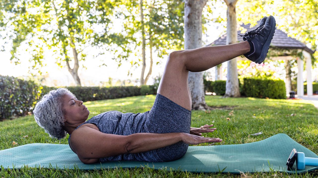 Woman doing functional strength training at home