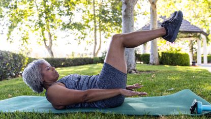 Woman doing functional strength training at home