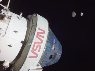 The Earth and moon as seen from the Orion spacecraft during its Artemis 1 mission.