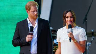 Prince Harry and Meghan Markle speak on stage at Global Citizen Live