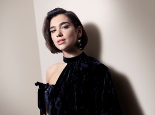 Dua Lipa wearing black