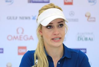 Paige Spiranac pictured in tears during a 2016 press conference